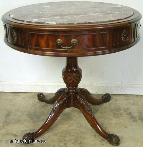 Antique Flame Mahogany Marble Top Drum Table