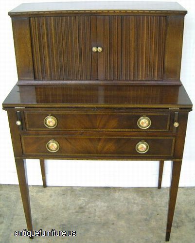 Antique Flame Mahogany Tambour Desk